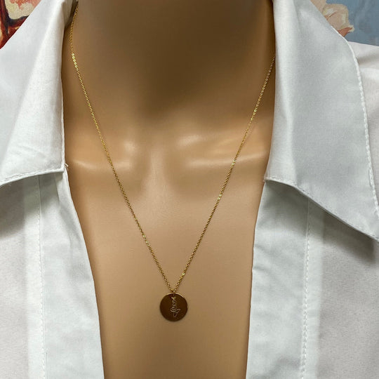 Gold Hand Stamped Mermaid Necklace, our tiny sweet mermaid is hand stamped on a gold disk with a 14k gold filled chain, it's adoring charm makes an endless treasure.